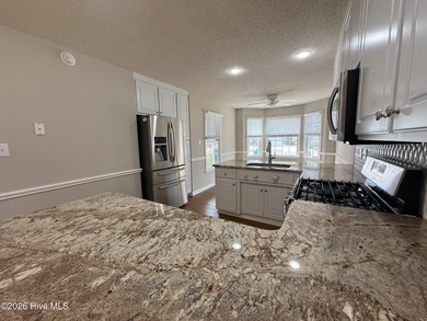 This beautifully maintained all brick home sits on one of the on Taberna Country Club in North Carolina - for sale on GolfHomes.com, golf home, golf lot