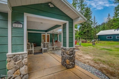 This impeccably maintained Priest Lake home perfectly blends on Priest Lake Golf and Tennis Club in Idaho - for sale on GolfHomes.com, golf home, golf lot