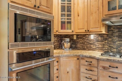 This impeccably maintained Priest Lake home perfectly blends on Priest Lake Golf and Tennis Club in Idaho - for sale on GolfHomes.com, golf home, golf lot