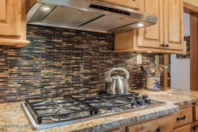 This impeccably maintained Priest Lake home perfectly blends on Priest Lake Golf and Tennis Club in Idaho - for sale on GolfHomes.com, golf home, golf lot