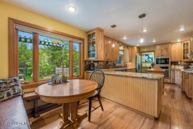 This impeccably maintained Priest Lake home perfectly blends on Priest Lake Golf and Tennis Club in Idaho - for sale on GolfHomes.com, golf home, golf lot