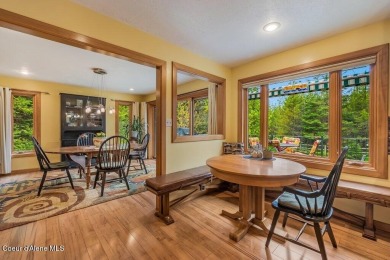 This impeccably maintained Priest Lake home perfectly blends on Priest Lake Golf and Tennis Club in Idaho - for sale on GolfHomes.com, golf home, golf lot