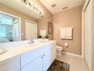 This light-filled 2-bedroom, 2-bath condominium offers the on Naples Heritage Golf and Country Club in Florida - for sale on GolfHomes.com, golf home, golf lot