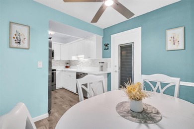 Beautifully updated villa-style condo with an oversized attached on Highland Lakes Executive Golf Course in Florida - for sale on GolfHomes.com, golf home, golf lot