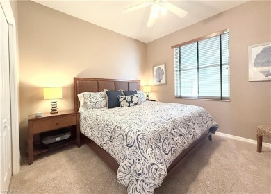 This light-filled 2-bedroom, 2-bath condominium offers the on Naples Heritage Golf and Country Club in Florida - for sale on GolfHomes.com, golf home, golf lot