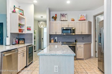 Immaculately Maintained, Move-In Ready Villa with Pool and No on Silverthorn Country Club in Florida - for sale on GolfHomes.com, golf home, golf lot