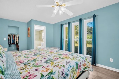 Beautifully updated villa-style condo with an oversized attached on Highland Lakes Executive Golf Course in Florida - for sale on GolfHomes.com, golf home, golf lot