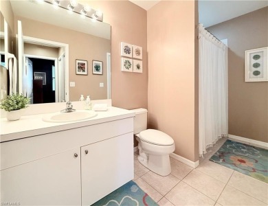 This light-filled 2-bedroom, 2-bath condominium offers the on Naples Heritage Golf and Country Club in Florida - for sale on GolfHomes.com, golf home, golf lot
