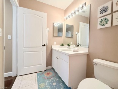 This light-filled 2-bedroom, 2-bath condominium offers the on Naples Heritage Golf and Country Club in Florida - for sale on GolfHomes.com, golf home, golf lot