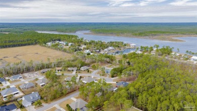 Embrace coastal living just minutes from the beach! This vacant on Orange Beach Golf Center in Alabama - for sale on GolfHomes.com, golf home, golf lot