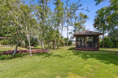 Sanctuary of Elegance and Serenity - Nestled amidst nature's on Laurel Island Links in Georgia - for sale on GolfHomes.com, golf home, golf lot