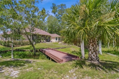 Sanctuary of Elegance and Serenity - Nestled amidst nature's on Laurel Island Links in Georgia - for sale on GolfHomes.com, golf home, golf lot