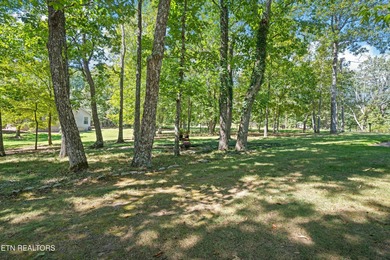 Wake up each morning to gorgeous sunrises from this golf front on Stonehenge Golf Course in Tennessee - for sale on GolfHomes.com, golf home, golf lot