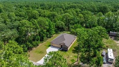 Wow! 3 car garage, and Huge Savings! Don't Miss OWNING this on Pine Ridge Community Golf and Country Club in Florida - for sale on GolfHomes.com, golf home, golf lot