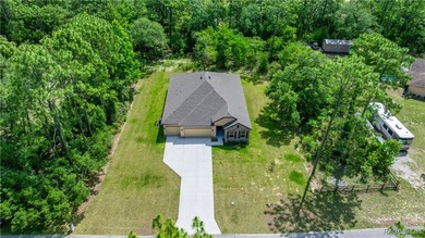 Wow! 3 car garage, and Huge Savings! Don't Miss OWNING this on Pine Ridge Community Golf and Country Club in Florida - for sale on GolfHomes.com, golf home, golf lot