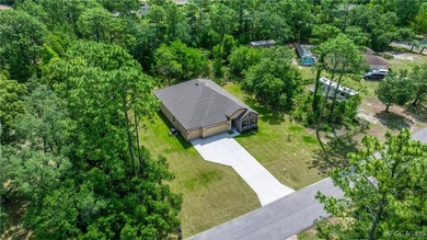 Wow! 3 car garage, and Huge Savings! Don't Miss OWNING this on Pine Ridge Community Golf and Country Club in Florida - for sale on GolfHomes.com, golf home, golf lot