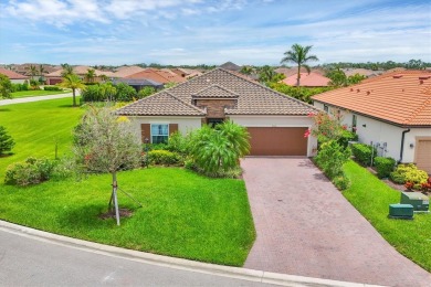 Situated on a generous corner lot within the gated Rosedale Golf on Rosedale Golf and Tennis Club in Florida - for sale on GolfHomes.com, golf home, golf lot