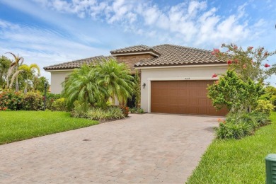 Situated on a generous corner lot within the gated Rosedale Golf on Rosedale Golf and Tennis Club in Florida - for sale on GolfHomes.com, golf home, golf lot