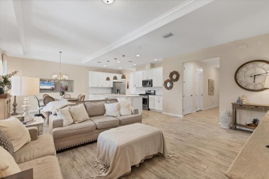 Situated on a generous corner lot within the gated Rosedale Golf on Rosedale Golf and Tennis Club in Florida - for sale on GolfHomes.com, golf home, golf lot