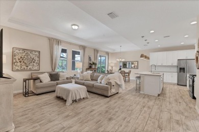 Situated on a generous corner lot within the gated Rosedale Golf on Rosedale Golf and Tennis Club in Florida - for sale on GolfHomes.com, golf home, golf lot