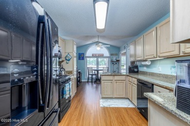 SCHEDULE YOUR SHOWING!!! COZY AND SERENE WITH THE ABILITY FOR on Harbour Point Golf Club in North Carolina - for sale on GolfHomes.com, golf home, golf lot