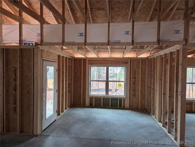 Welcome to this quality-built 3BR/2BA home in the gated Woodlake on Woodlake Country Club in North Carolina - for sale on GolfHomes.com, golf home, golf lot