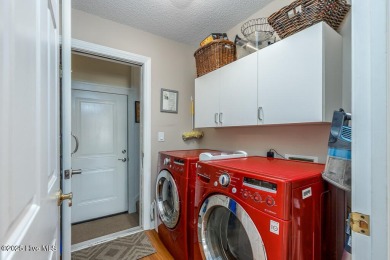SCHEDULE YOUR SHOWING!!! COZY AND SERENE WITH THE ABILITY FOR on Harbour Point Golf Club in North Carolina - for sale on GolfHomes.com, golf home, golf lot