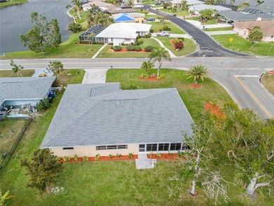 Very spacious 2 bedroom, 2 bath, 2-car garage corner lot home in on Jacaranda West Country Club in Florida - for sale on GolfHomes.com, golf home, golf lot