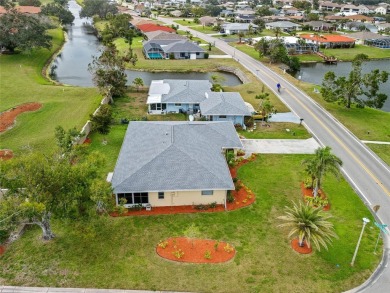 Very spacious 2 bedroom, 2 bath, 2-car garage corner lot home in on Jacaranda West Country Club in Florida - for sale on GolfHomes.com, golf home, golf lot