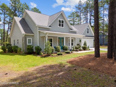 Discover the perfect home at 202 Woodland Circle in Foxfire, NC! on Foxfire Golf and Country Club in North Carolina - for sale on GolfHomes.com, golf home, golf lot