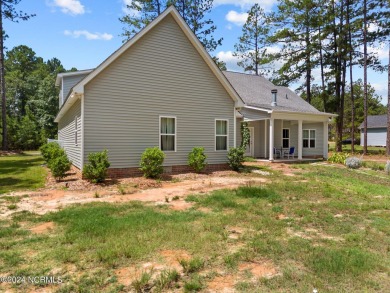 Discover the perfect home at 202 Woodland Circle in Foxfire, NC! on Foxfire Golf and Country Club in North Carolina - for sale on GolfHomes.com, golf home, golf lot