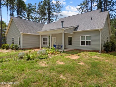 Discover the perfect home at 202 Woodland Circle in Foxfire, NC! on Foxfire Golf and Country Club in North Carolina - for sale on GolfHomes.com, golf home, golf lot