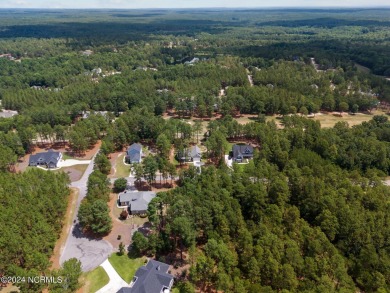 Discover the perfect home at 202 Woodland Circle in Foxfire, NC! on Foxfire Golf and Country Club in North Carolina - for sale on GolfHomes.com, golf home, golf lot