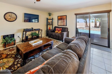 Welcome to 701 Paseo Granada!  This fully furnished pool home is on London Bridge Golf Course in Arizona - for sale on GolfHomes.com, golf home, golf lot