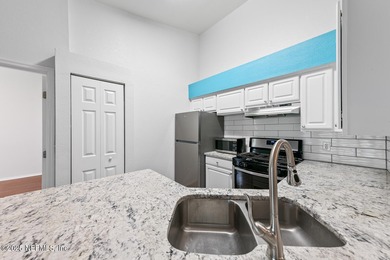 if you've ever wanted your own personal treehouse - this condo on Windsor Parke Golf Club in Florida - for sale on GolfHomes.com, golf home, golf lot