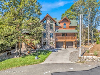 Stunning custom-built log chalet in desirable Eagle Rock Resort on Eagle Rock Golf and Ski Resort in Pennsylvania - for sale on GolfHomes.com, golf home, golf lot