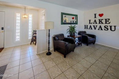 Welcome to 701 Paseo Granada!  This fully furnished pool home is on London Bridge Golf Course in Arizona - for sale on GolfHomes.com, golf home, golf lot