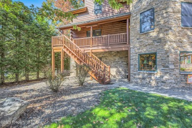 Stunning custom-built log chalet in desirable Eagle Rock Resort on Eagle Rock Golf and Ski Resort in Pennsylvania - for sale on GolfHomes.com, golf home, golf lot