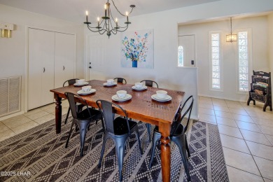 Welcome to 701 Paseo Granada!  This fully furnished pool home is on London Bridge Golf Course in Arizona - for sale on GolfHomes.com, golf home, golf lot
