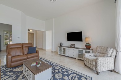 Enjoy the finest of Florida living in this stunning single-story on Ironhorse Country Club in Florida - for sale on GolfHomes.com, golf home, golf lot