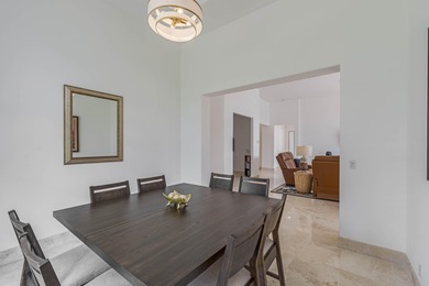 Enjoy the finest of Florida living in this stunning single-story on Ironhorse Country Club in Florida - for sale on GolfHomes.com, golf home, golf lot