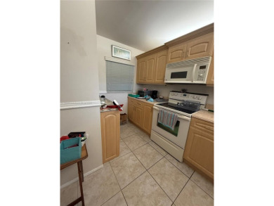 Spacious 2BR/2BA condo located in the highly sought-after Pine on Jacaranda Golf Club in Florida - for sale on GolfHomes.com, golf home, golf lot