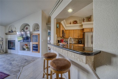 Welcome to your waterfront retreat in the highly sought-after on Los Lagos Golf Club in Arizona - for sale on GolfHomes.com, golf home, golf lot