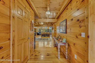 Stunning custom-built log chalet in desirable Eagle Rock Resort on Eagle Rock Golf and Ski Resort in Pennsylvania - for sale on GolfHomes.com, golf home, golf lot