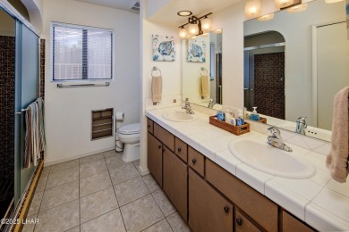 Welcome to 701 Paseo Granada!  This fully furnished pool home is on London Bridge Golf Course in Arizona - for sale on GolfHomes.com, golf home, golf lot