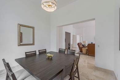 Enjoy the finest of Florida living in this stunning single-story on Ironhorse Country Club in Florida - for sale on GolfHomes.com, golf home, golf lot