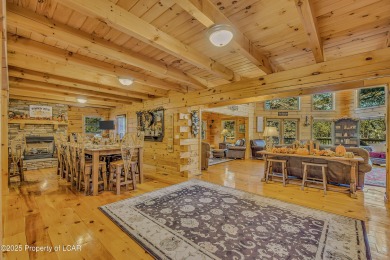 Stunning custom-built log chalet in desirable Eagle Rock Resort on Eagle Rock Golf and Ski Resort in Pennsylvania - for sale on GolfHomes.com, golf home, golf lot