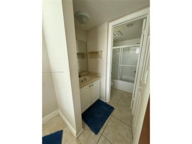 Spacious 2BR/2BA condo located in the highly sought-after Pine on Jacaranda Golf Club in Florida - for sale on GolfHomes.com, golf home, golf lot
