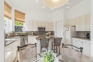 Enjoy the finest of Florida living in this stunning single-story on Ironhorse Country Club in Florida - for sale on GolfHomes.com, golf home, golf lot