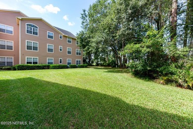 if you've ever wanted your own personal treehouse - this condo on Windsor Parke Golf Club in Florida - for sale on GolfHomes.com, golf home, golf lot